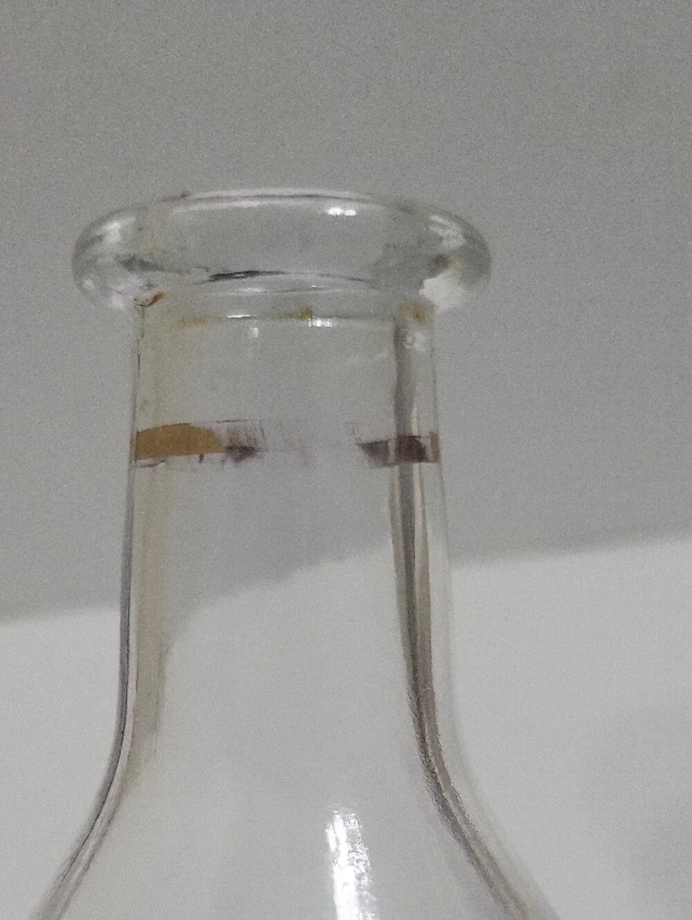 Clear Glass Decanter with Gold Accent and Leaf Etching.